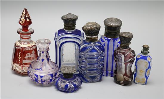 Eight 19th century overlaid glass scent bottles